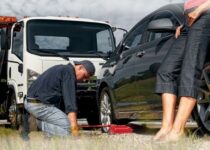 Images of a breakdown car being attended to by a breakdown recovery mechanic