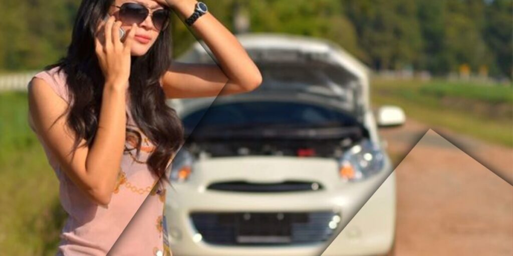 A stranded woman calling her mobile recovery service in reading